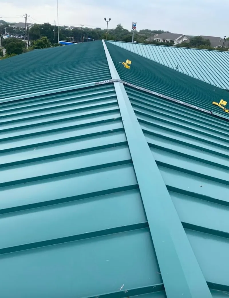 Green commercial metal roof ridge and valley for Metal Roof Repair in Fort Mitchell