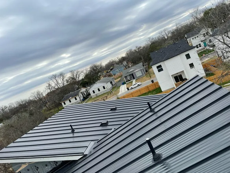 Standing seam metal roof panels with vents for Skylight Repair in Fort Mitchell